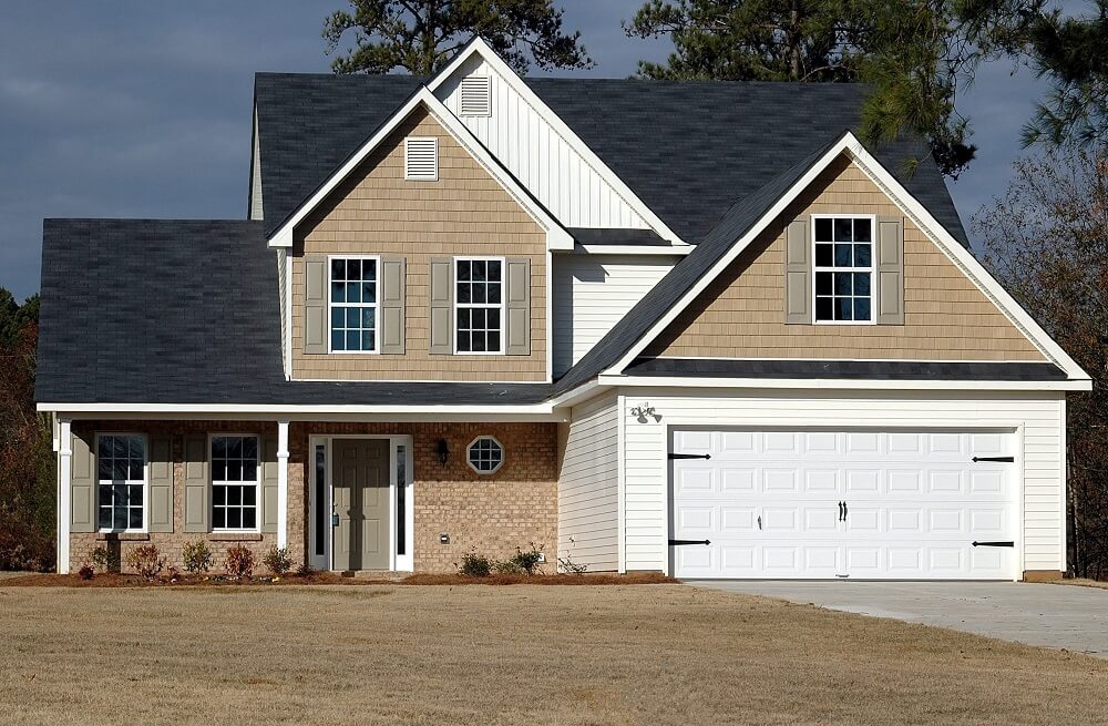 beige house with double garage