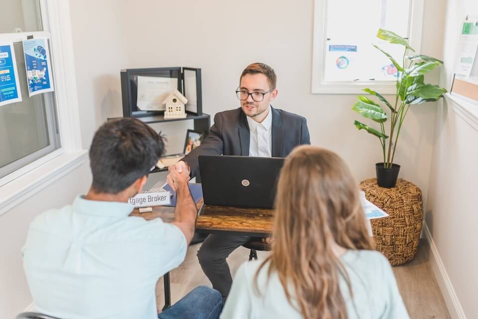 couple meeting with mortgage broker for first time