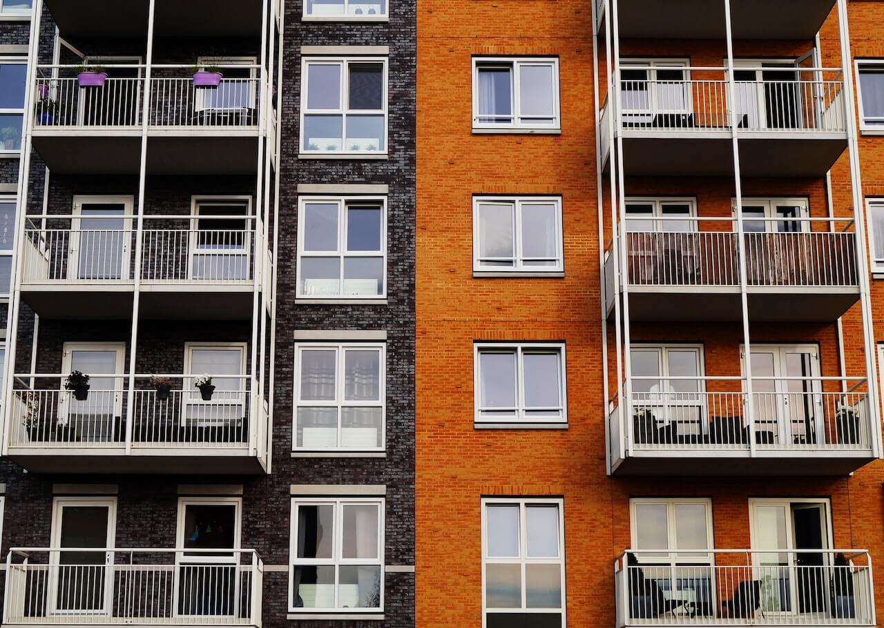 grey and orange apartment building